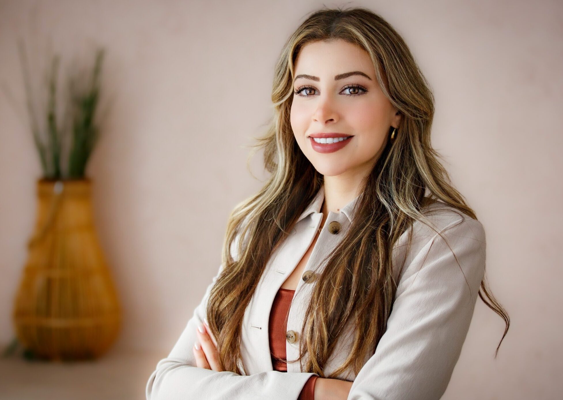Jouvana Killiny, founder of Elevate Legal, smiling in professional attire